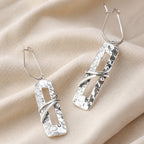 Elongated Silver Rustic Earrings